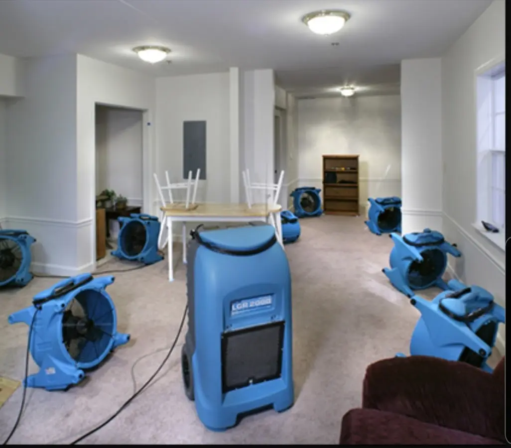 Air movers and dehumidifier setup for Water Damage Restoration in Fate